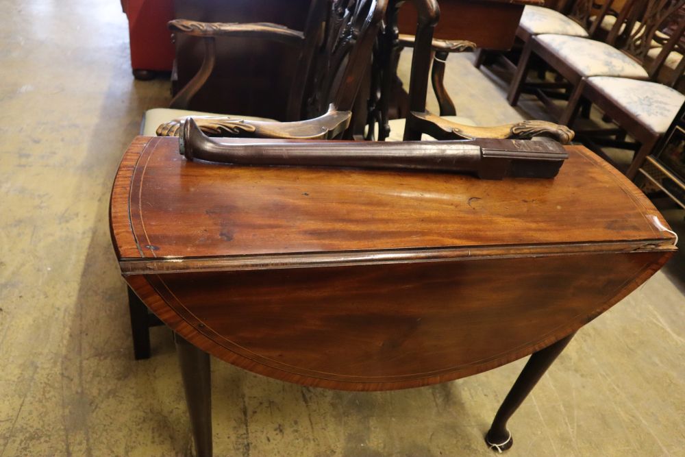 A George III crossbanded mahogany pad foot dining table, width 94cm 90cm (extended) height 70cm